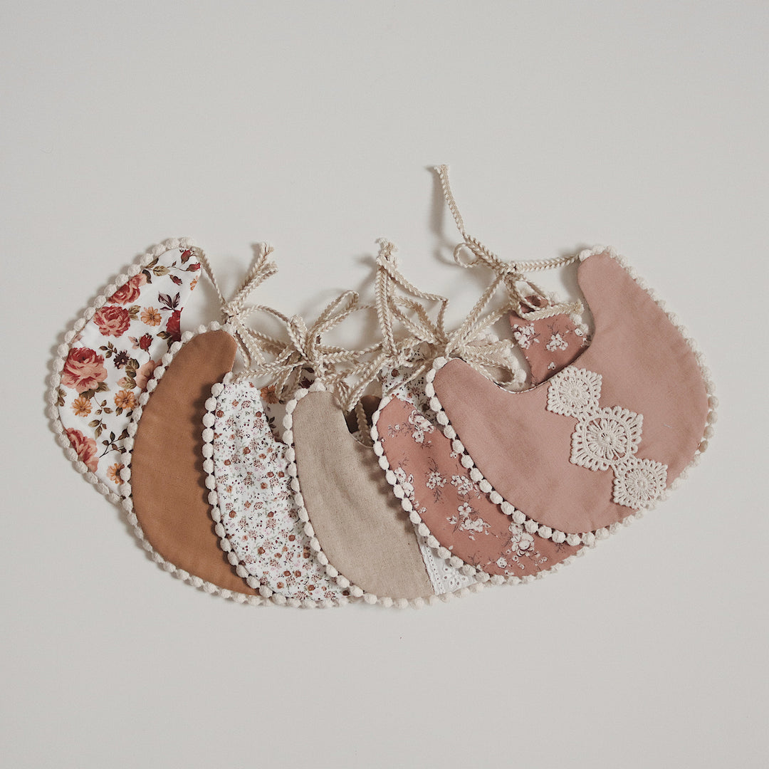 Drool bibs are usually made of cotton or other absorbent materials to soak up liquid, while food bibs are made of silicone. Discover More: www.littledaisydream.com